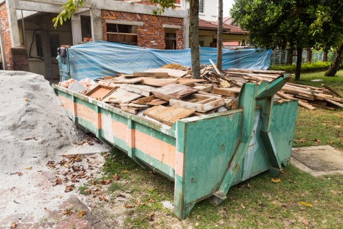 Construction workers clearing waste in Lewisham